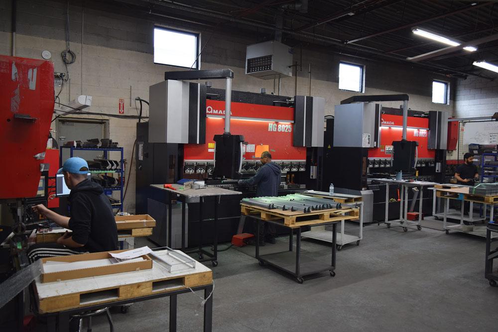 A precision-turned metal component on a CNC lathe